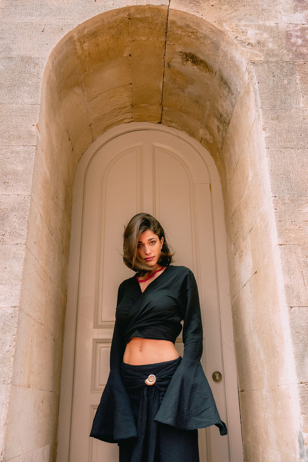 Coral Wrap Black Blouse